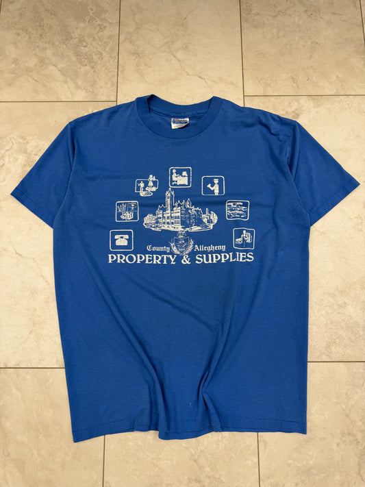 (L) Vintage 80’s Allegheny County Property and Supplies Graphic Tee